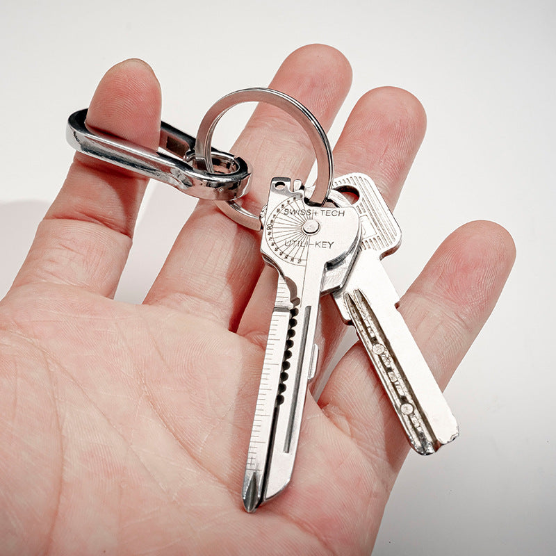 Outdoor multi-functional tool combination set self-defense portable mini knife bottle opener eight-in-one keychain edc