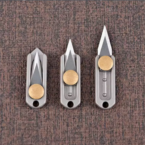 Titanium mini pusher knife, can be attached to a keychain.