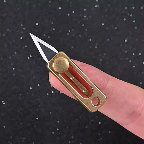 Titanium mini pusher knife, can be attached to a keychain.
